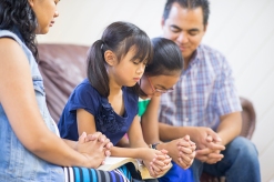 Young family praying